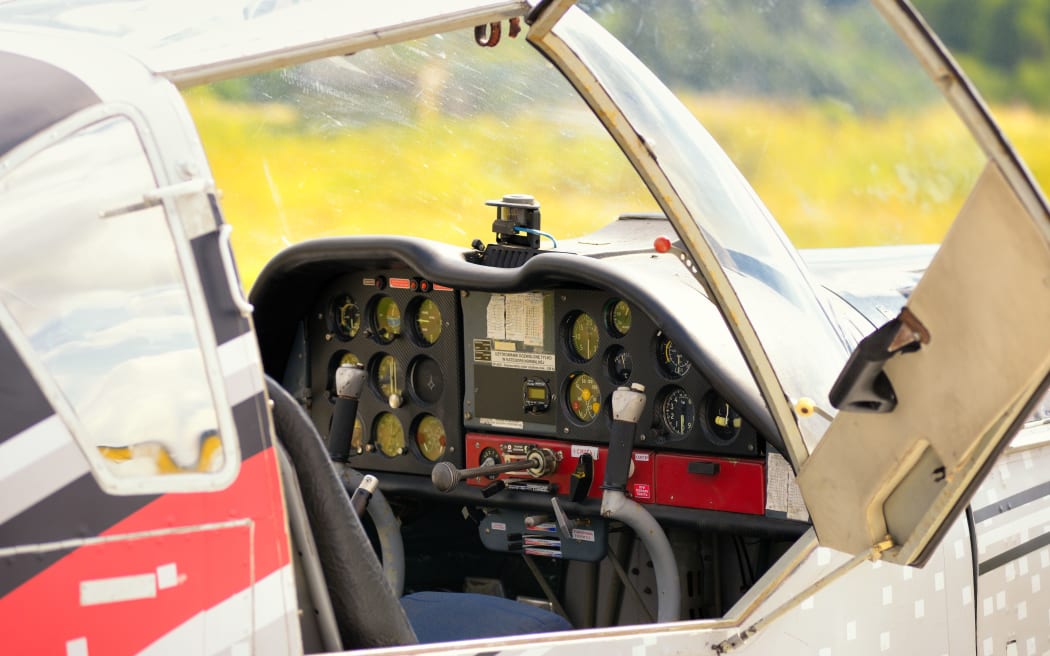 Control panel in the small cockpit of a microlight plane