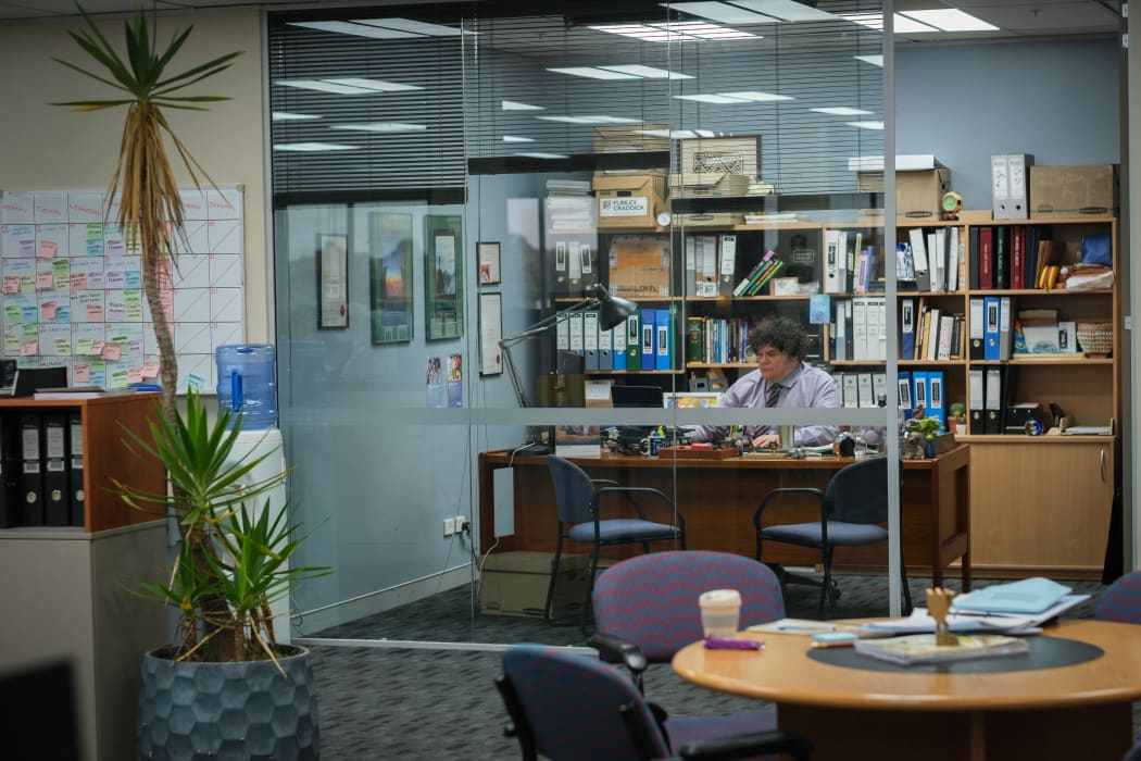 Josh Thomson as HR advisor Martin Katavake in his office