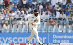 Ajaz Patel of New Zealand celebrating the wicket of Virat Kohli of India during day 3 of the 3rd Test Match between India and New Zealand held at the Wankhede Stadium, Mumbai.