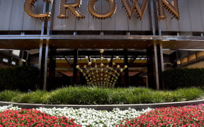 A Crown logo above the Melbourne Casino on 14 February, 2022.