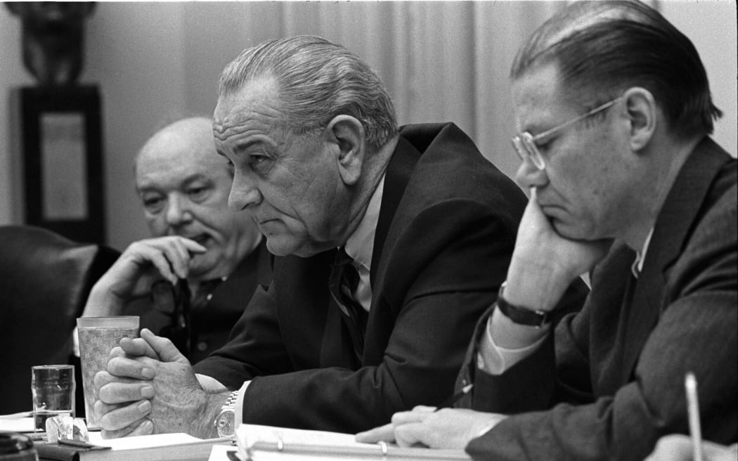 A US Cabinet meeting with President Lyndon B Johnson (centre) and US Secretary of Defence Robert McNamara (right), on 9 February 1968.