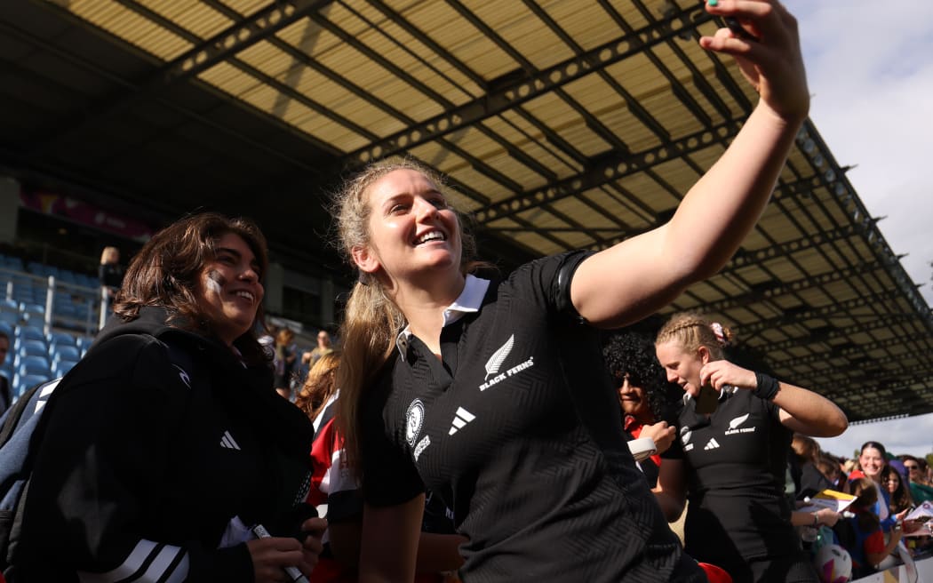 Alana Bremner of New Zealand with fans.