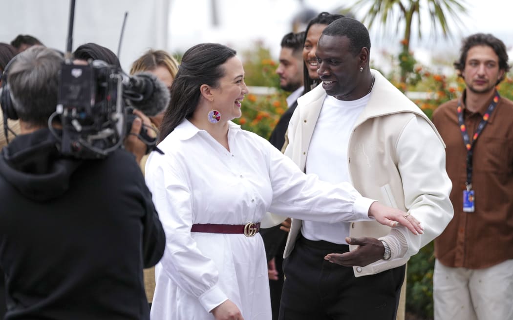 Jury members Lily Gladstone, left, and Omar Sy pose for photographers during the jury photo call at the 77th international film festival, Cannes, southern France, Tuesday, May 14, 2024.