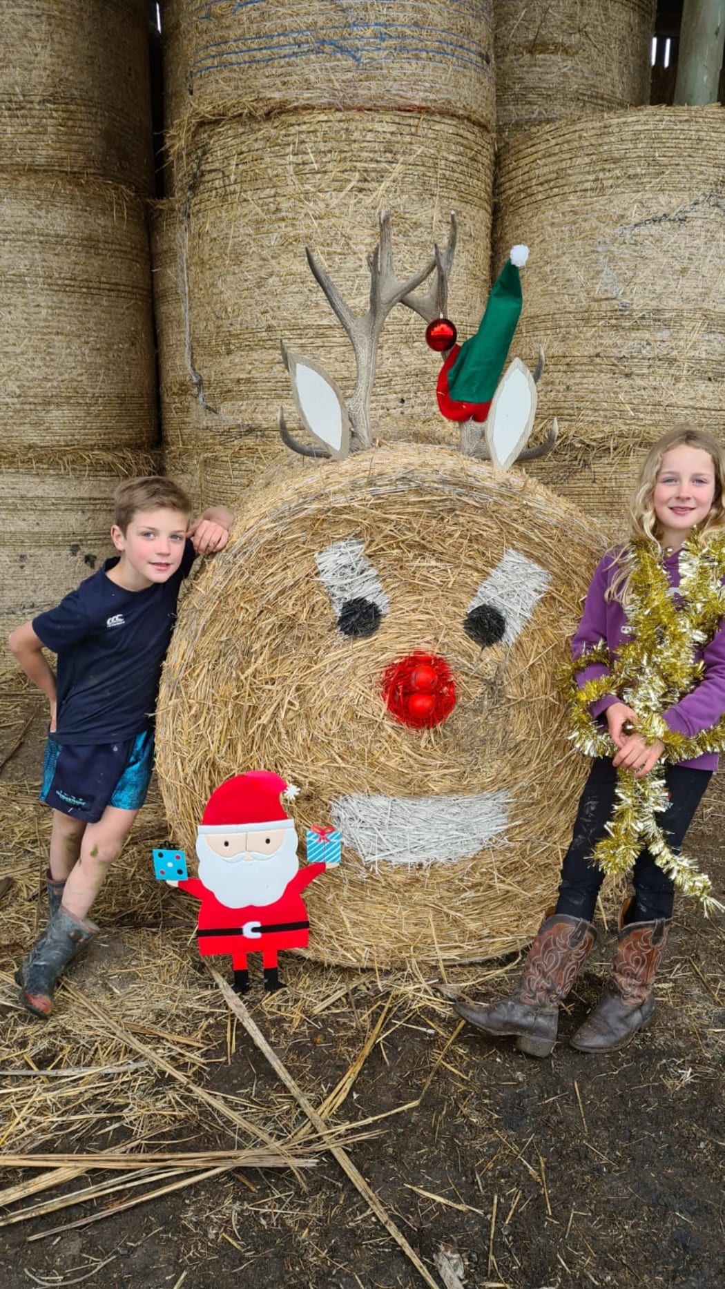 Ryan and Charleigh with their decorated hay bail.