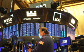 Traders work the floor of the New York Stock Exchange during morning trading on 5 May 2022 in New York City.