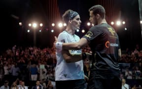 Handshake between Mostafa Asal - Paul Coll and New Zealand’s Paul Coll was beaten in the final of the El Gouna International in Cairo in a three set defeat to Egyptian Mostafa Asal. June 4 2022