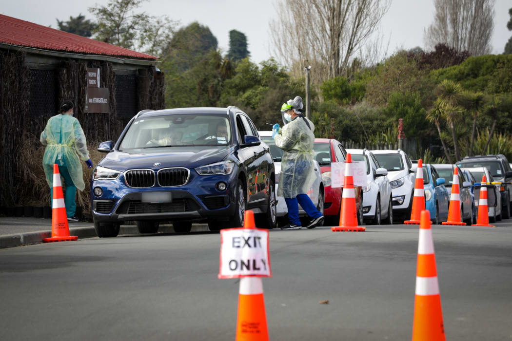 Cars lining up outside a drive through testing station, Pages Road, Christchurch.