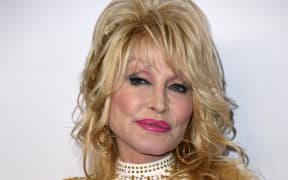 US singer-songwriter and 2019 MusiCares Person Of The Year Dolly Parton arrives for the 2019 MusiCares Person Of The Year gala at the Los Angeles Convention Center in Los Angeles on February 8, 2019. (Photo by Valerie MACON / AFP)