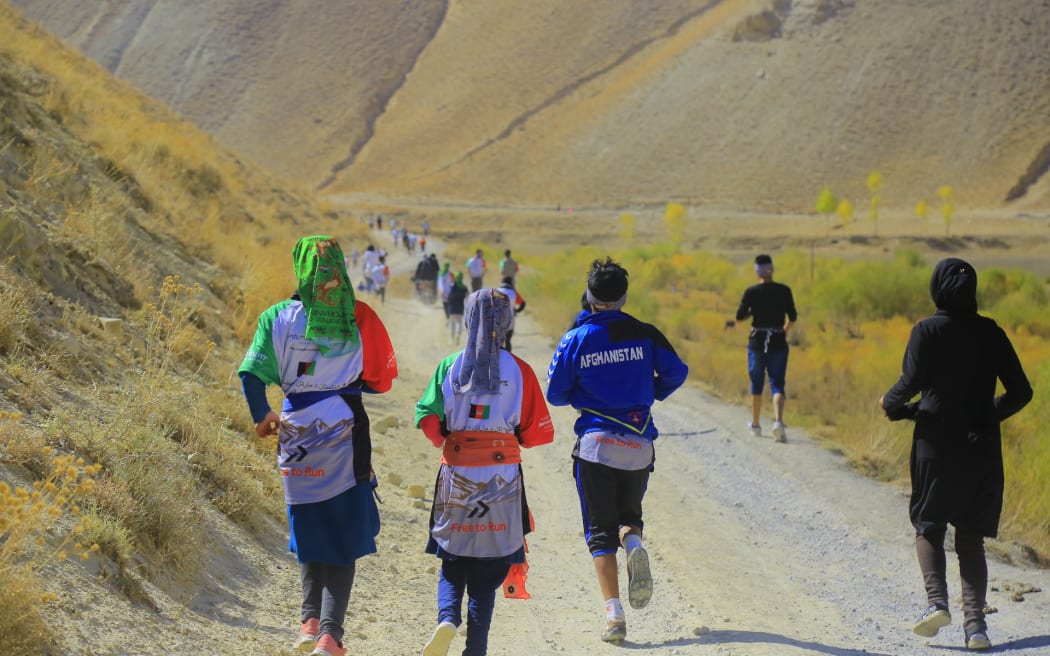 Women take part in the Afghanistan Marathon in Afghanistan.