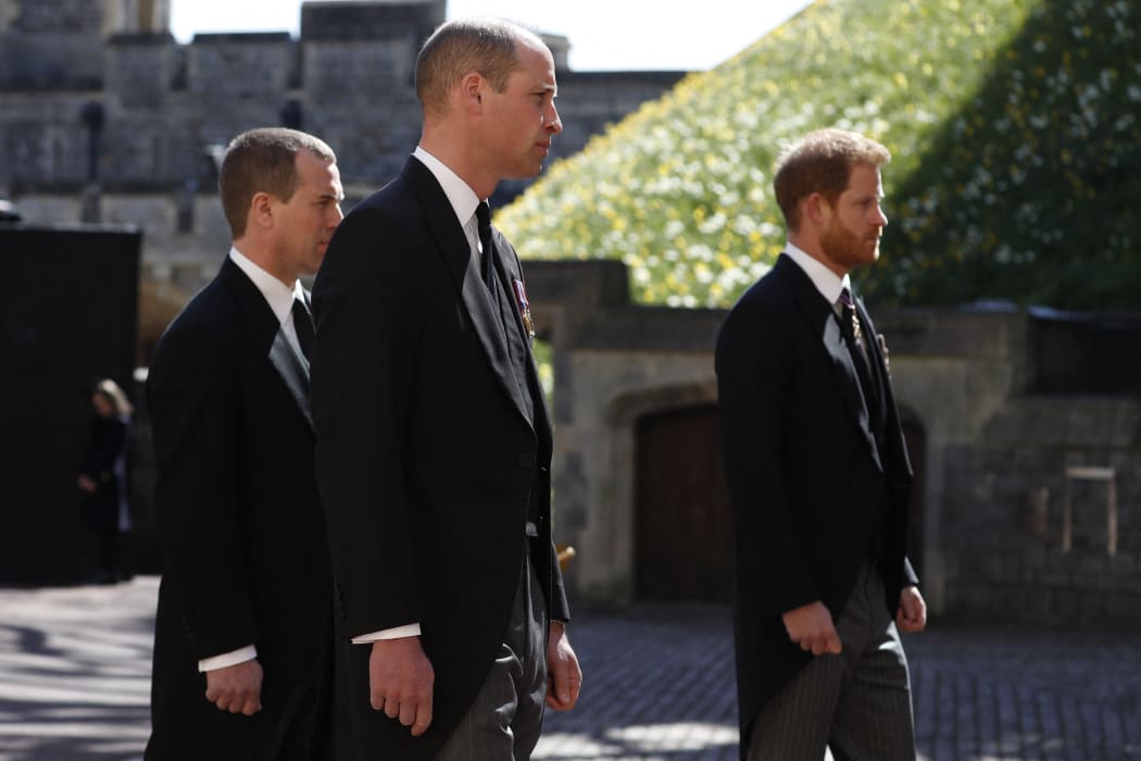 Prince William, left, and Prince Harry walk in the procession behind the Duke of Edinburgh's coffin.