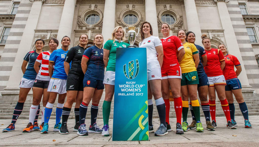 Team captain's pose with the World Cup trophy ahead of the women's Rugby World Cup.