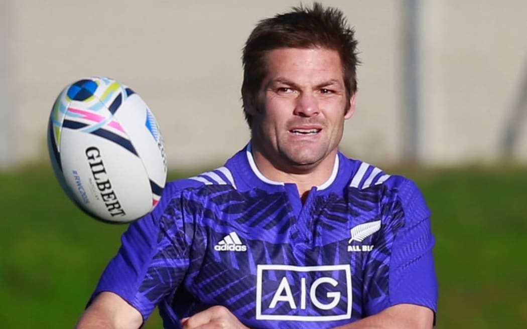 Richie McCaw of the All Blacks passes during training session at Swansea University on October 13, 2015.
