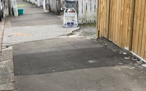 A swastika spray-painted outside Temple Sinai.