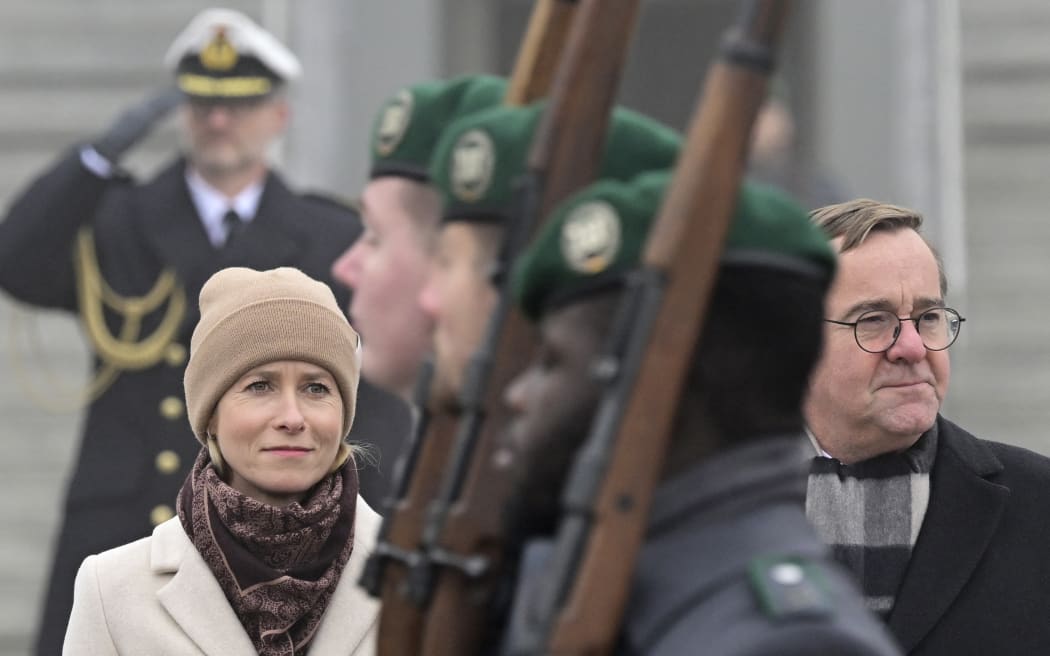German Defence Minister Boris Pistorius (R) and the European Union's High Representative for Foreign Affairs and Security Policy Kaja Kallas review a military honor guard in front of the defence ministry in Berlin, at the start of their meeting on January 13, 2026. (Photo by John MACDOUGALL / AFP)