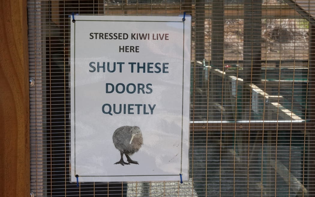 A sign on the door of the new facility.