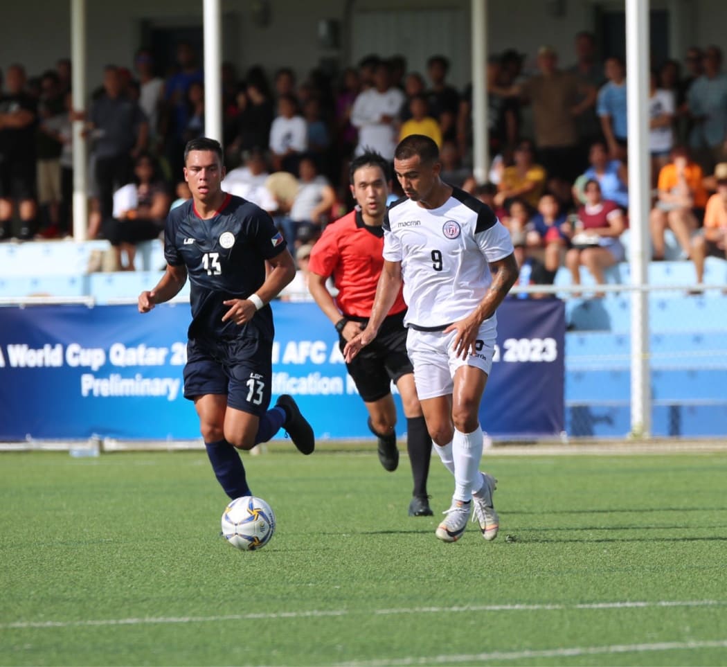 Marcus Lopez scores Guam's only goal from the penalty spot.