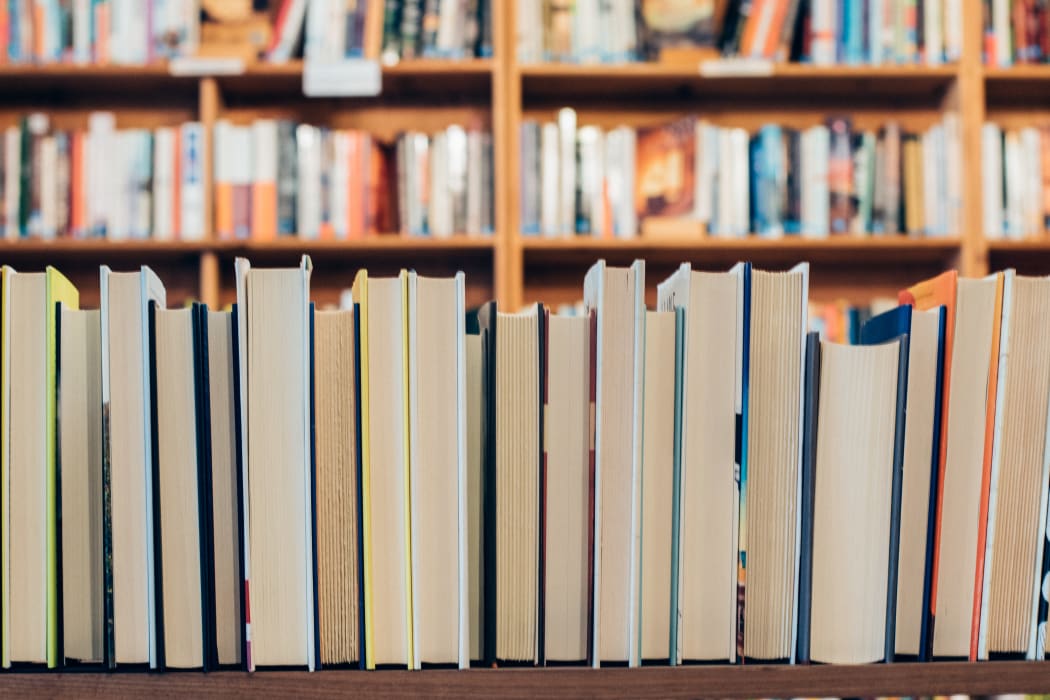 Books in a bookshelf.