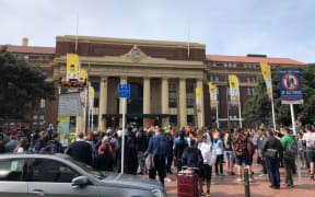 A crowd outside the central Wellington railway station, after a threat sparked an evacuation.