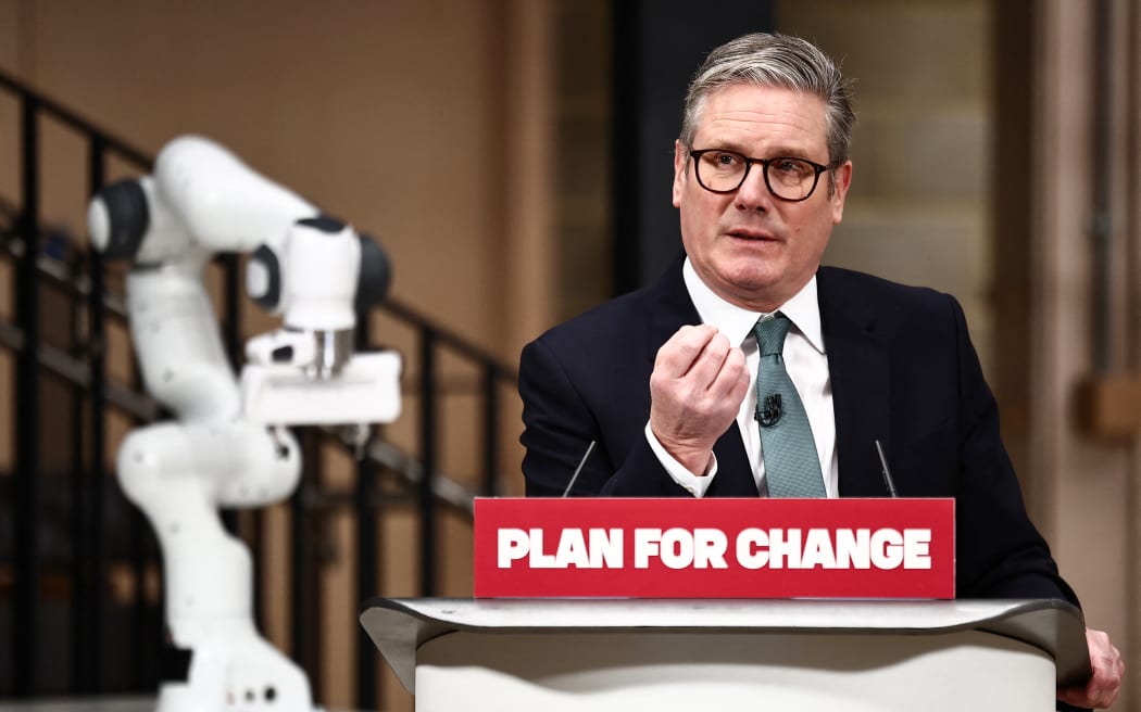 Britain's Prime Minister Keir Starmer delivers a speech during a visit of the Manufacturing Futures Lab at UCL (University College London), in London, on January 13, 2025, as he prepares to launch a plan to harness AI to spur growth and efficiency in the country. Despite ethical and security concerns surrounding the technology, British Prime Minister Keir Starmer intends to attract AI companies to his country with the promise of regulatory flexibility, thereby setting himself apart from the European Union.