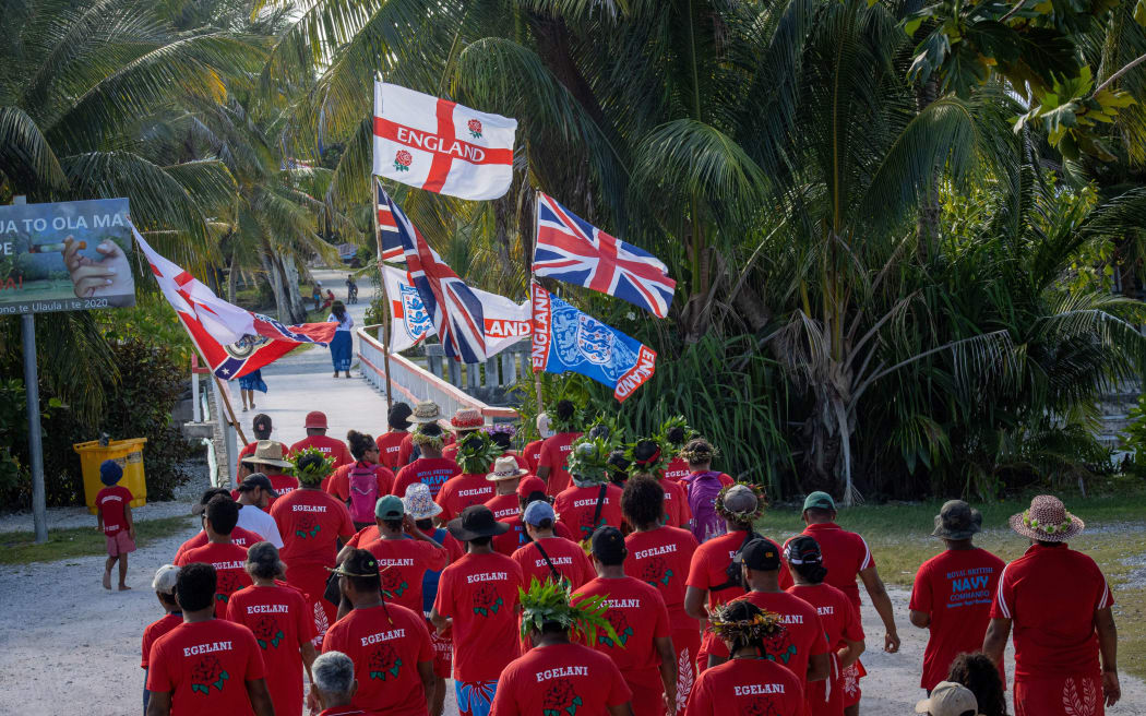 Egelani marches to the pitch on the morning of the game against Amelika.