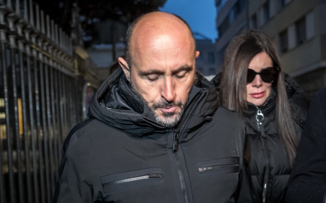 Owners of Le Constellation bar Jacques Moretti (L) and Jessica Moretti arrive for a hearing at the Office of the public prosecutor of the Canton of Valais, in Sion, on January 9, 2026. The French couple, facing charges of manslaughter by negligence, bodily harm by negligence and arson by negligence, have been called in for questioning after 40 people, most of them teenagers, were killed, while 116 were injured in a fire that ripped through a bar in the luxury Alpine ski resort of Crans-Montana on New Year's Eve. (Photo by Fabrice COFFRINI / AFP)