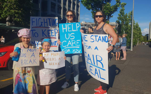 Esme and Frey Battson, 6 and 4, out in support of their junior doctor mum.