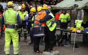 Sonya and Daniel Rockhouse embrace before entering the Pike River drift.