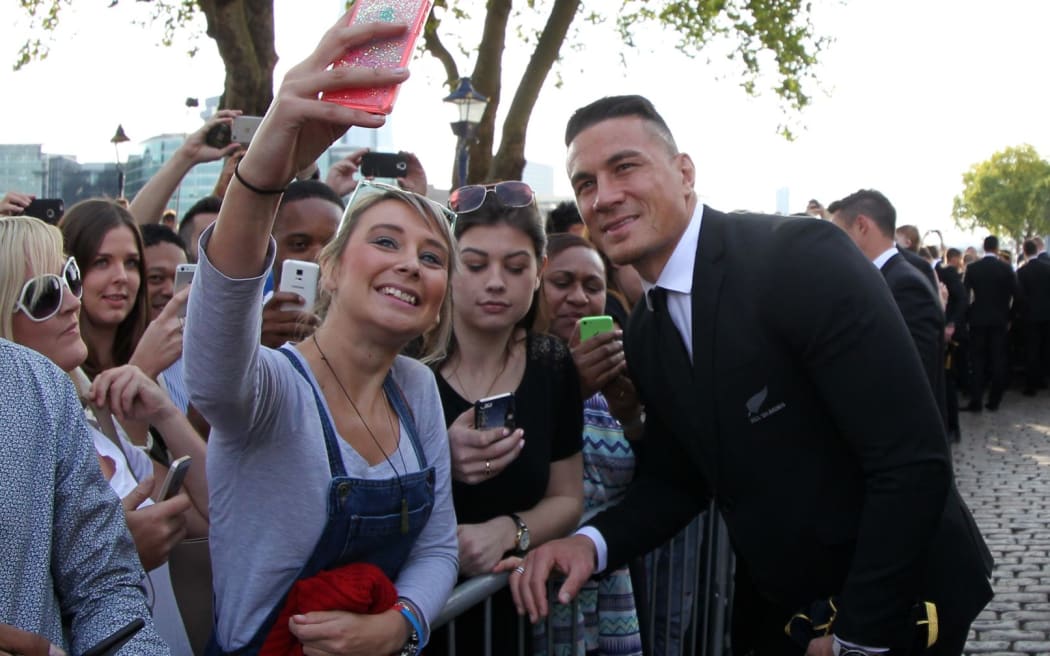 All Blacks midfielder Sonny Bill Williams mingles with fans at the Tower of London.