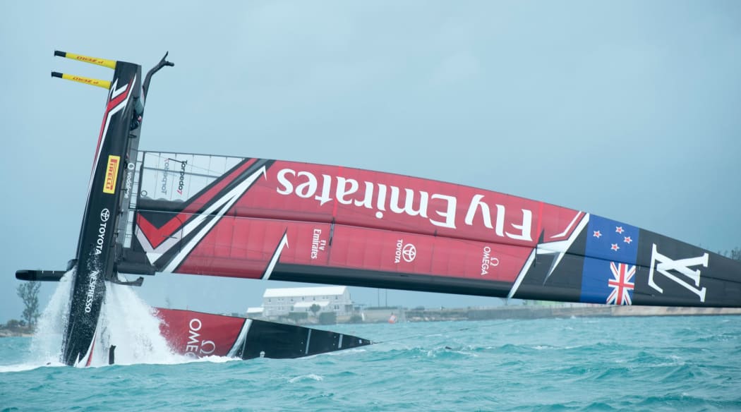Team New Zealand capsized just moments after crossing the start line.