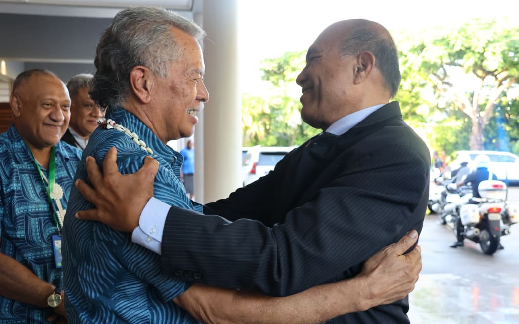 Pacific Islands Forum Secretary-General Henry Puna, left, greets Kiribati President Taneti Maamau in Nadi