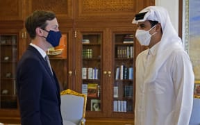 Senior advisor to US President Jared Kushner (left) meeting with Qatar's ruler Emir Sheikh Tamim bin Hamad al-Thani in the capital Doha as shown in a picture released on December 2, 2020.