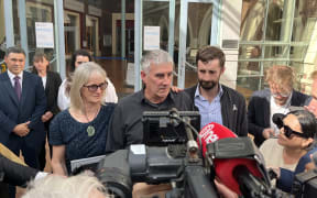 Pauline Hanna supporters speak to media outside Auckland High Court following verdict on 23 September 2024.