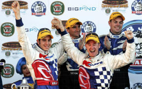 Greg Murphy (R) and co driver Rick Kelly on the podium after winning Bathurst for the second year in a row.2004.