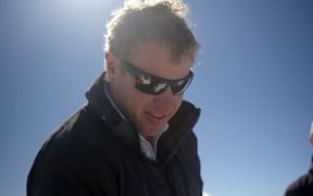 Helicopter pilot Nick Wallis in a screenshot from the video posted to Facebook by his family.