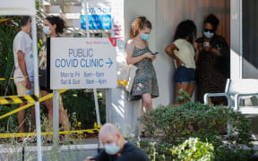 People wait in line to be tested for Covid-19 at Royal Perth Hospital in Perth on 31 January.