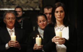 Jennifer Evans, right, a niece of one of the bombing victims, at the Westminster Abbey service.
