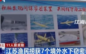 A screengrab of a Chinese TV report on the drone findings.