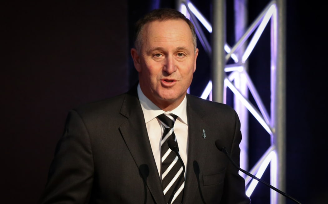 John Key at the All Blacks RWC 2015 squad announcement.
