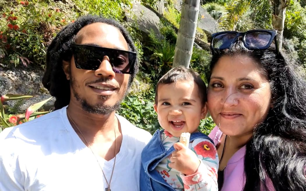 Walter Spears and Roshni Sami with their child.