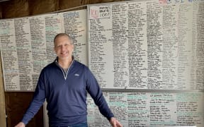 Mike O’Brien with his phrase board.