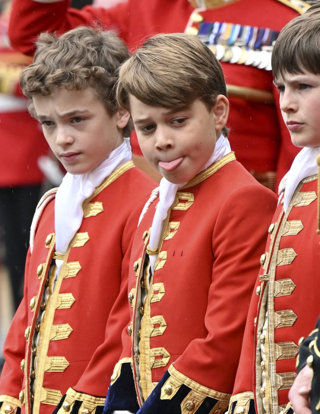 Britain's Prince George of Wales (C) stands at Westminster Abbey in central London on May 6, 2023, ahead of the coronations of Britain's King Charles III and Britain's Camilla, Queen Consort. - The set-piece coronation is the first in Britain in 70 years, and only the second in history to be televised. Charles will be the 40th reigning monarch to be crowned at the central London church since King William I in 1066. Outside the UK, he is also king of 14 other Commonwealth countries, including Australia, Canada and New Zealand. Camilla, his second wife, will be crowned queen alongside him, and be known as Queen Camilla after the ceremony. (Photo by Andy Stenning / POOL / AFP)