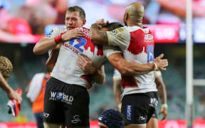 The Lions celebrate a try.