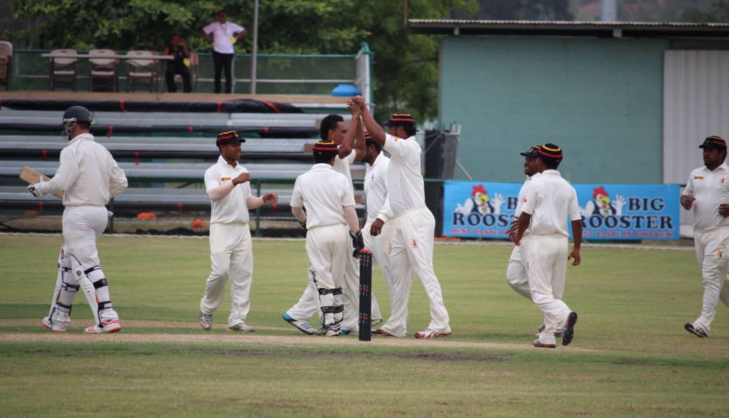 PNG celebrate a wicket on day two against Namibia.