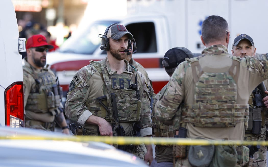 Law enforcement respond to a mass shooting during the Kansas City Chiefs Super Bowl LVIII victory parade on 14 February, 2024 in Kansas City, Missouri.