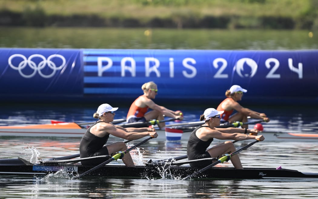 New Zealand's Brooke Francis (L) and New Zealand's Lucy Spoors compete in the women's double sculls semifinal A/B rowing competition at Vaires-sur-Marne Nautical Centre in Vaires-sur-Marne during the Paris 2024 Olympic Games on July 30, 2024. (Photo by Olivier MORIN / AFP)