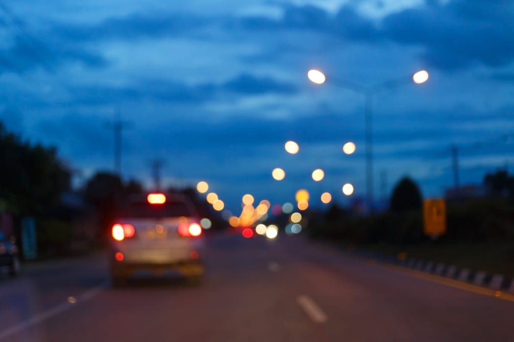 night light of traffic car on the city street, abstract blur bokeh background