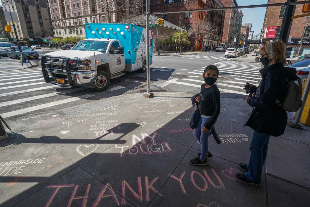 Thank you messages are written on the sidewalk outside of Mt. Sinai West Medical Center on April 7, 2020 in New York.