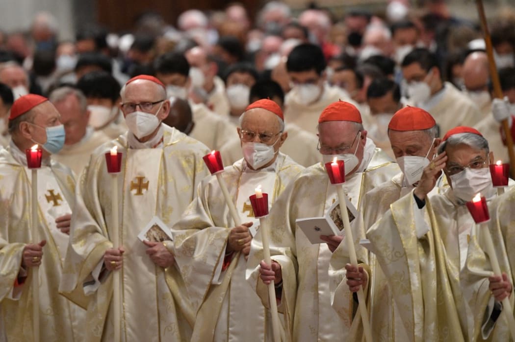 Cardinals attend the Easter Vigil mass on 16 April, 2022 at St Peter's Basilica in The Vatican.