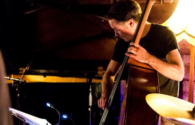 Nick Tipping in his element - behind the bass at a jazz gig.