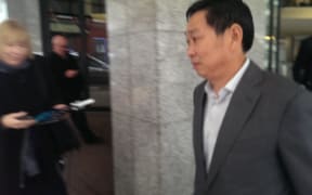 Donghua Liu leaving Auckland District Court on Wednesday.